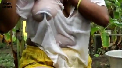 Indian sizzling ultra-cute servant female showing her boobs and seducing neighbour at out door - Wowmoyback