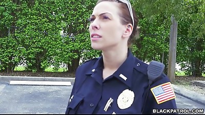Female cops pull over black suspect and gargle his cock