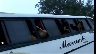 Naughty Brazilian nymphs determined to cause mayhem in the bus hanging out of the window their juicy lush nude butts and  bra-stuffers