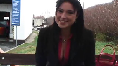 Sexy black-haired Lets Camera Man Feel her Funbags In Public