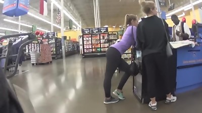 Candid sexy teens with peach bottom bending at counter