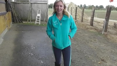German girl in bench blue fleece jacket giving head in public