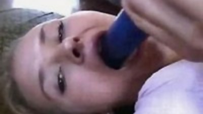 Blue dildo in wet holes