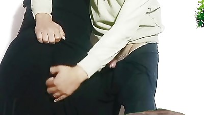 Madame Soher, Sharmouta El Maadi, wears a jilbab and hijab, and pummels her husband's step son